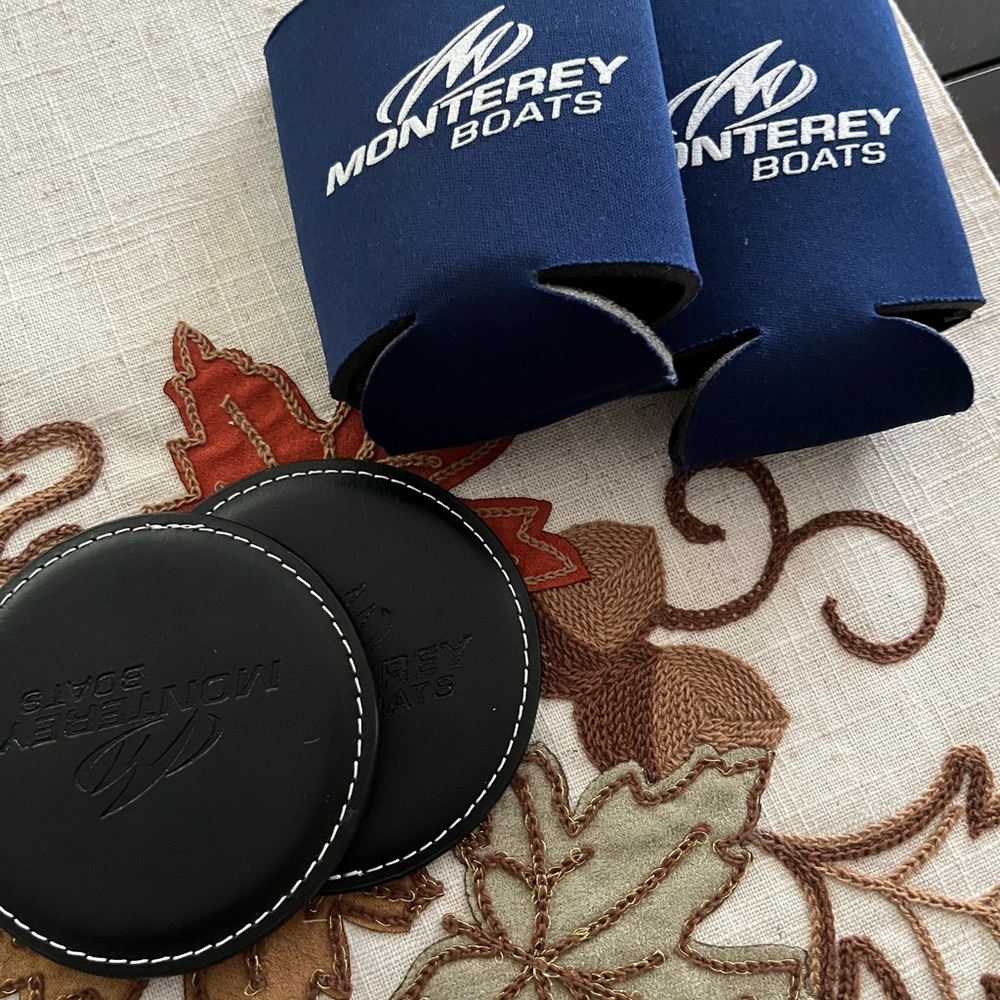 Navy Can Cooler and Black Leather Coaster Set. Monterey boat.
